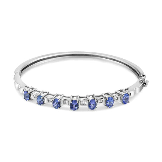 14K White Gold 5 MM Oval Blue Tanzanite and 1/4 Cttw Diamond Bangle (H - I Color, VS2 - SI1 Clarity) - Fits wrists up to 7 1/2 Inches - Jaazi Intl