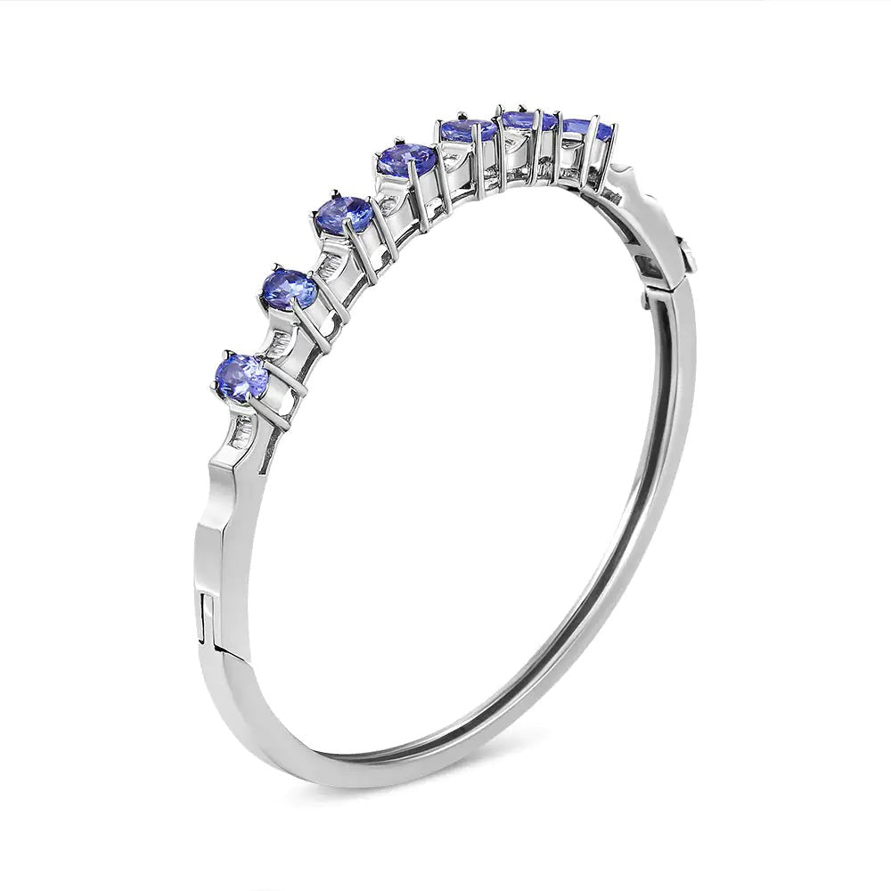 14K White Gold 5 MM Oval Blue Tanzanite and 1/4 Cttw Diamond Bangle (H - I Color, VS2 - SI1 Clarity) - Fits wrists up to 7 1/2 Inches - Jaazi Intl