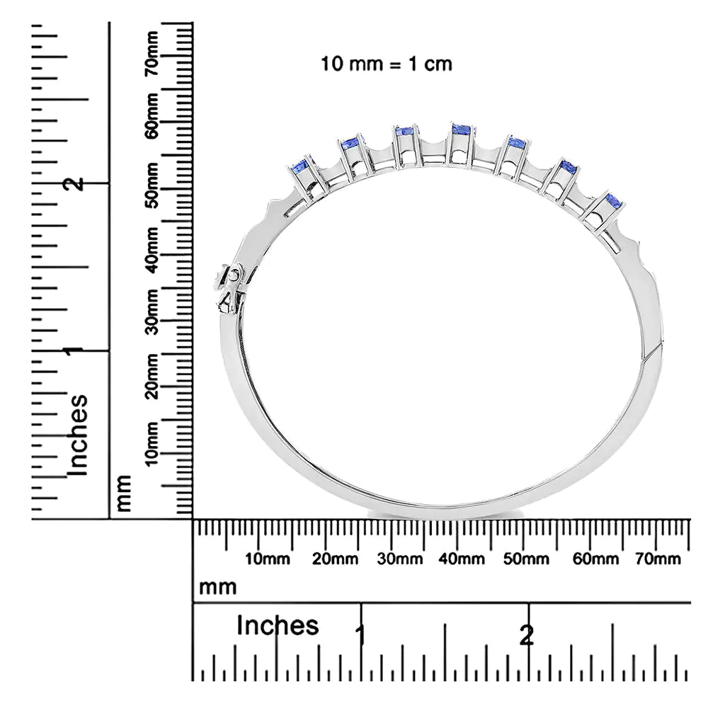 14K White Gold 5 MM Oval Blue Tanzanite and 1/4 Cttw Diamond Bangle (H - I Color, VS2 - SI1 Clarity) - Fits wrists up to 7 1/2 Inches - Jaazi Intl