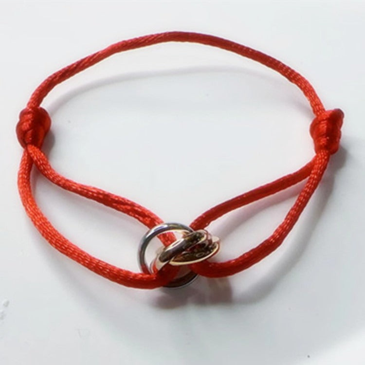 Couple de bracelets en corde rouge