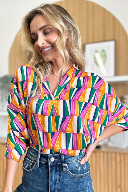 Double Take Full Size Geometric Notched Raglan Sleeve Blouse - Jaazi Intl